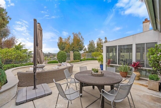 627 Avery Pl, Long Beach, CA 90807 - view of patio featuring fence and outdoor dining area