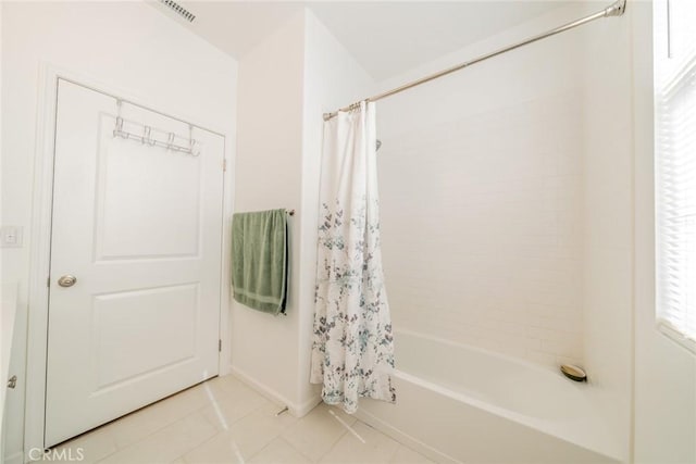 14168 Georgetown St, Hesperia, CA 92344 - bathroom featuring tile patterned flooring and shower / tub combo
