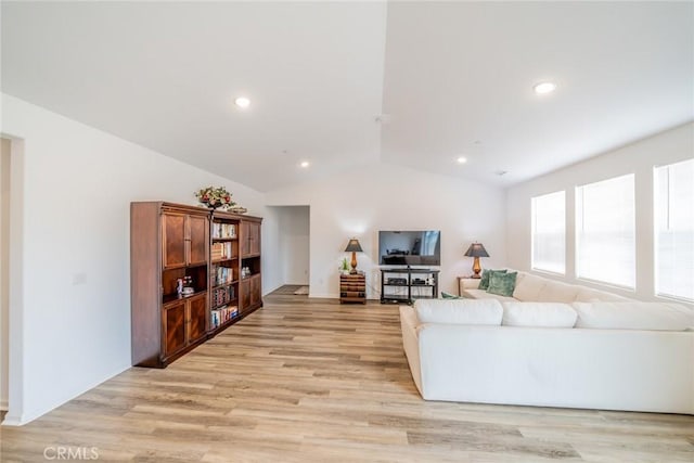14168 Georgetown St, Hesperia, CA 92344 - living area featuring lofted ceiling, light wood-style flooring, and recessed lighting
