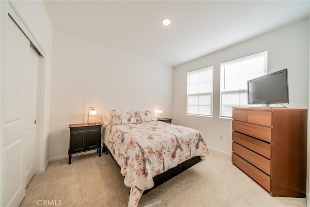 14168 Georgetown St, Hesperia, CA 92344 - bedroom featuring light colored carpet, baseboards, and a closet