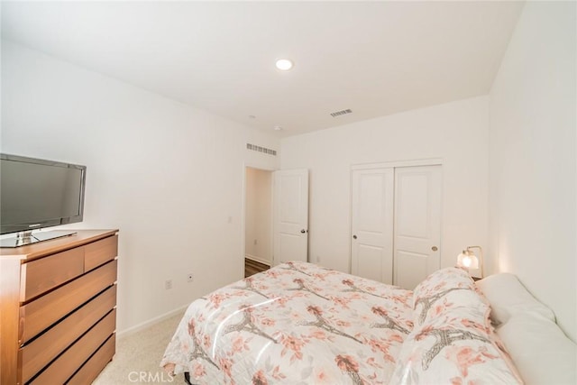 14168 Georgetown St, Hesperia, CA 92344 - bedroom featuring light colored carpet, a closet, and recessed lighting