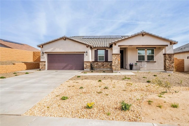 14168 Georgetown St, Hesperia, CA 92344 - view of front of house featuring stucco siding, concrete driveway, an attached garage, roof mounted solar panels, and a tiled roof