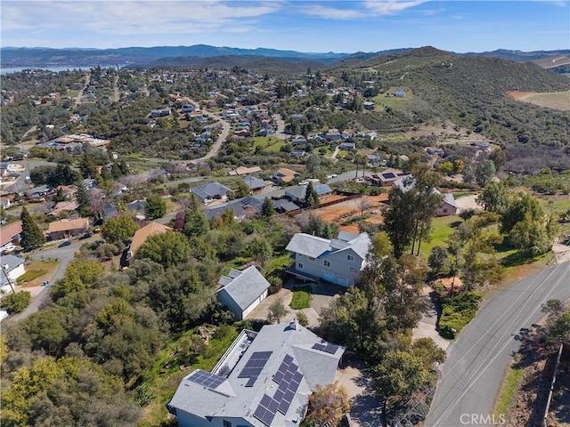 drone / aerial view with a residential view and a mountain view