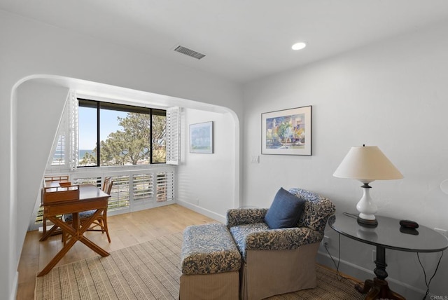 1552 Camino Del Mar Unit 623/625, Del Mar, CA 92014 - sitting room with baseboards, wood finished floors, recessed lighting, and arched walkways