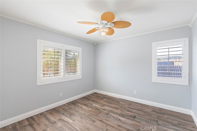 27077 Calendula St, Corona, CA 92883 - unfurnished room with ornamental molding, baseboards, dark wood-style floors, and a wealth of natural light