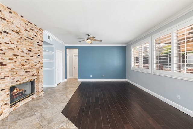 27077 Calendula St, Corona, CA 92883 - unfurnished living room with baseboards, a ceiling fan, a fireplace, crown molding, and wood finished floors