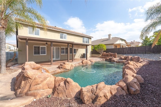 27077 Calendula St, Corona, CA 92883 - view of pool featuring a fenced in pool, a patio, a fenced backyard, and ceiling fan