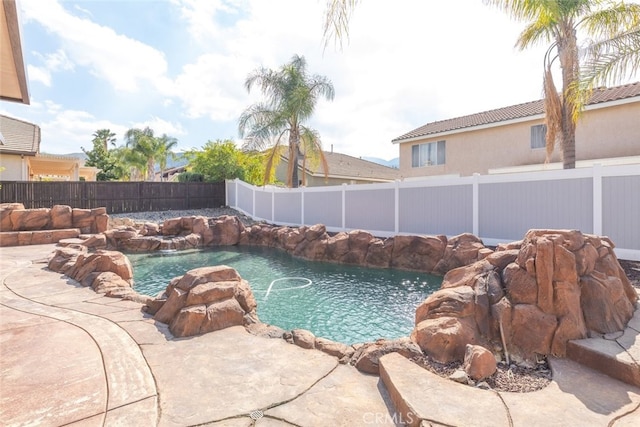27077 Calendula St, Corona, CA 92883 - view of swimming pool with a fenced in pool and a fenced backyard