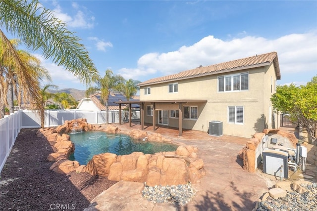 27077 Calendula St, Corona, CA 92883 - view of pool featuring a fenced in pool, a patio area, a fenced backyard, and central AC