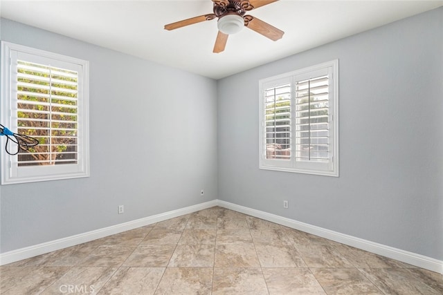 27077 Calendula St, Corona, CA 92883 - spare room featuring baseboards, a ceiling fan, and light tile patterned flooring
