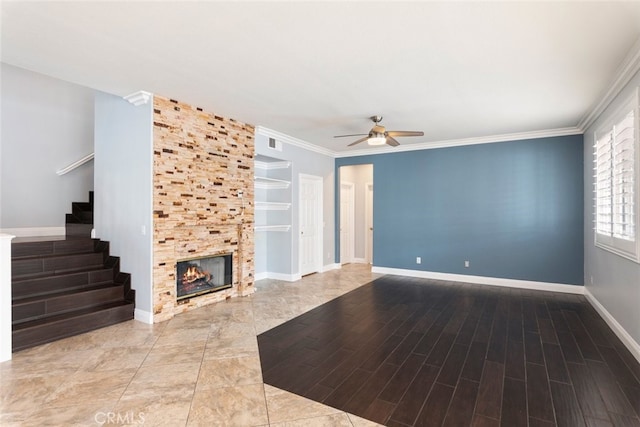 27077 Calendula St, Corona, CA 92883 - unfurnished living room with stairway, visible vents, wood finished floors, and ceiling fan