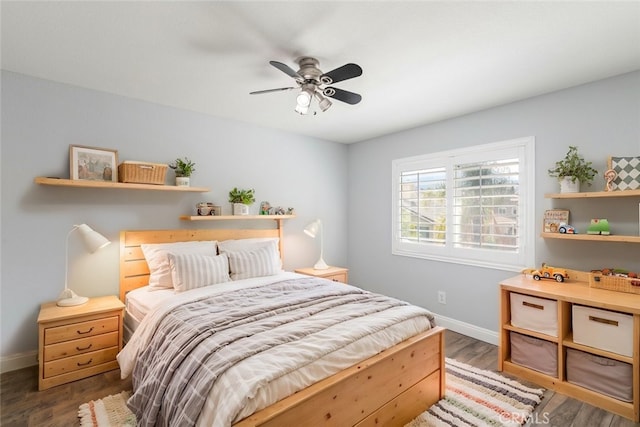 27077 Calendula St, Corona, CA 92883 - bedroom featuring baseboards, a ceiling fan, and wood finished floors