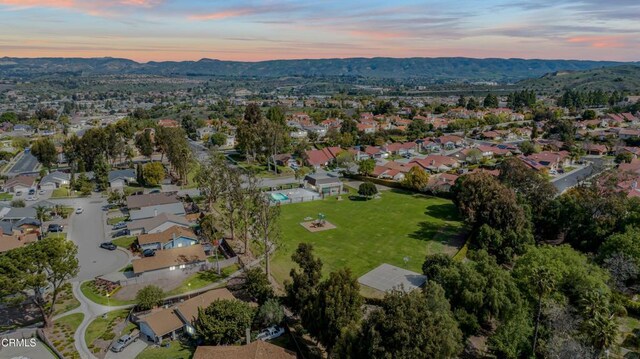 aerial view featuring a mountain view and a residential view