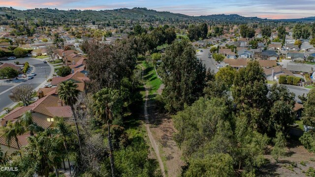aerial view featuring a residential view and a mountain view