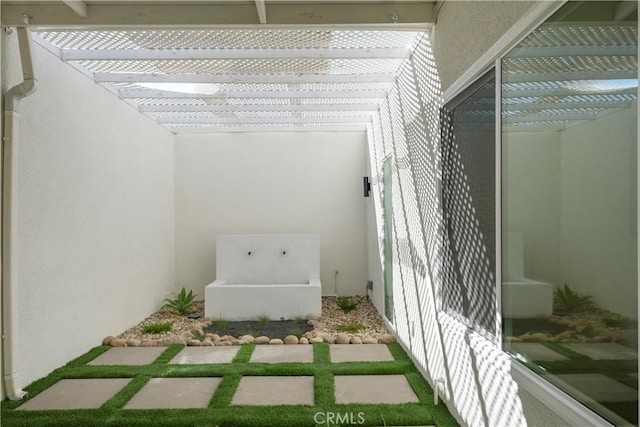 exterior space with a pergola