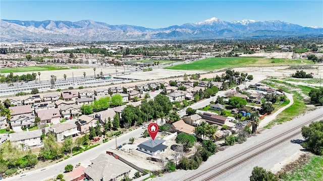 bird's eye view with a mountain view and a residential view