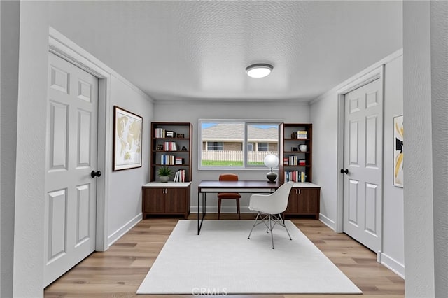 26339 First St, Loma Linda, CA 92318 - office space featuring crown molding, light wood-type flooring, a textured ceiling, and baseboards
