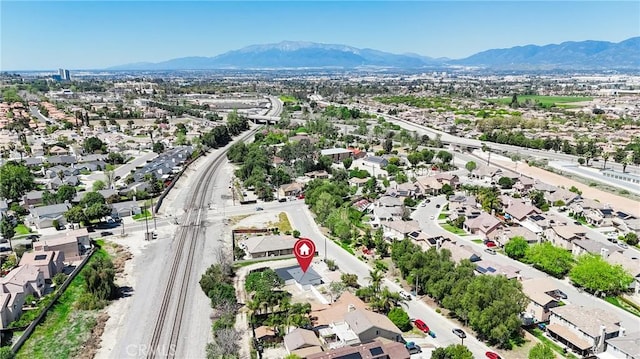 bird's eye view with a residential view and a mountain view