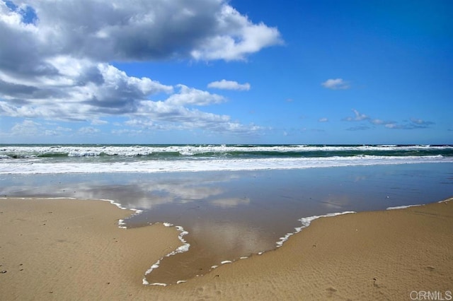 property view of water with a beach view
