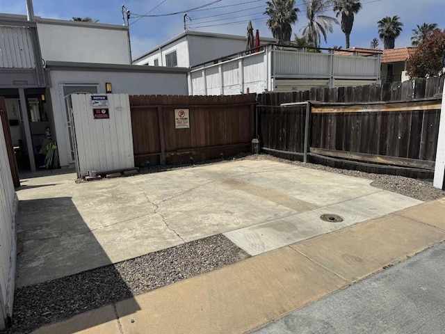view of patio / terrace featuring fence