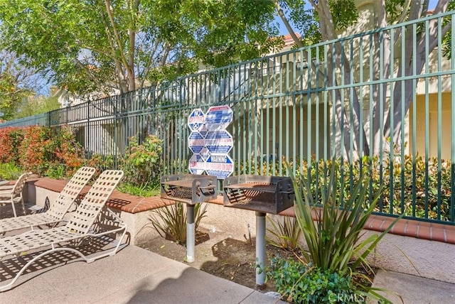 view of patio / terrace with fence