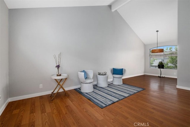 unfurnished room featuring high vaulted ceiling, beamed ceiling, baseboards, and wood finished floors