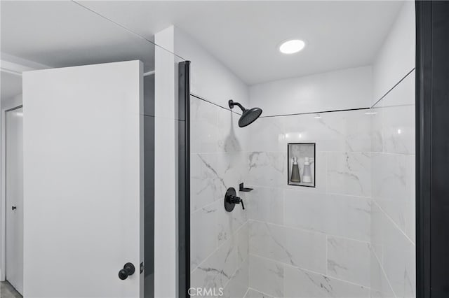 full bath featuring a shower stall