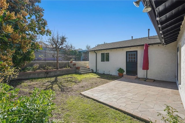 view of yard featuring a patio area and fence