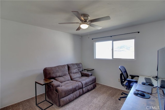 office area with carpet flooring and a ceiling fan