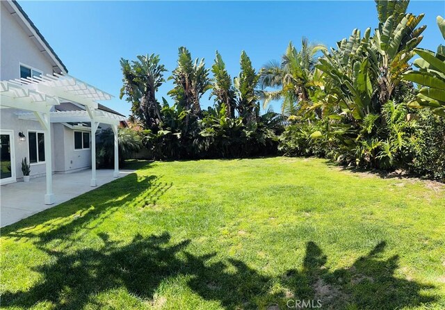 2204 Recodo Ct, Carlsbad, CA 92009 - view of green lawn featuring a pergola and a patio