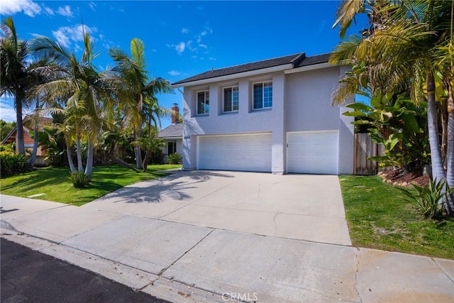 2204 Recodo Ct, Carlsbad, CA 92009 - traditional-style house with a garage, stucco siding, concrete driveway, and a front lawn