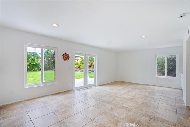 2204 Recodo Ct, Carlsbad, CA 92009 - empty room with plenty of natural light, recessed lighting, and light tile patterned flooring
