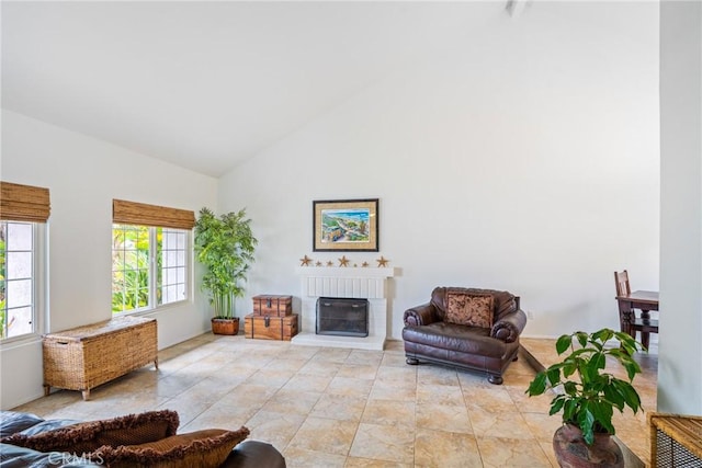 2204 Recodo Ct, Carlsbad, CA 92009 - living room with healthy amount of natural light, a fireplace, and high vaulted ceiling