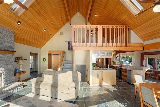 15516 Valley View Dr, Weed, CA 96094 - dining space featuring visible vents, a skylight, wood ceiling, and a ceiling fan
