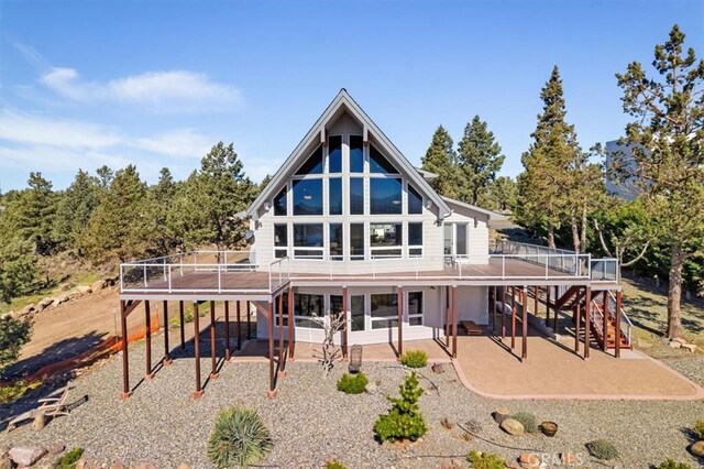 15516 Valley View Dr, Weed, CA 96094 - rear view of property with stairs, a wooden deck, and a patio area