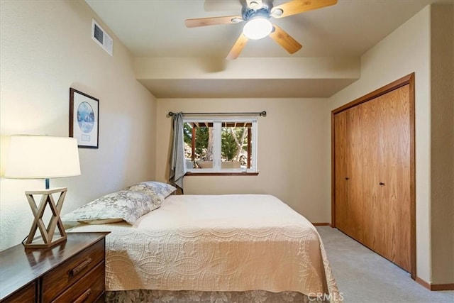 15516 Valley View Dr, Weed, CA 96094 - bedroom featuring light colored carpet, visible vents, a closet, and baseboards