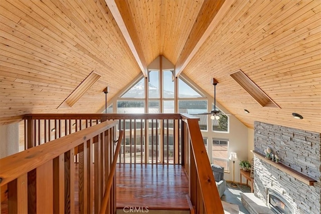 15516 Valley View Dr, Weed, CA 96094 - stairs featuring high vaulted ceiling, wooden ceiling, a ceiling fan, wood finished floors, and beamed ceiling