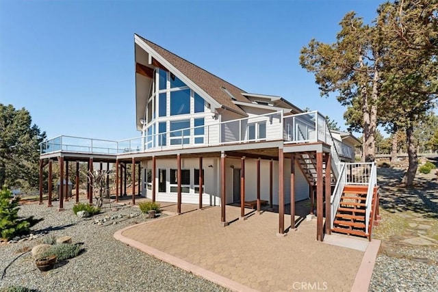 15516 Valley View Dr, Weed, CA 96094 - rear view of house with a wooden deck, stairs, and a patio area