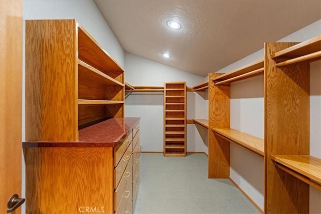 15516 Valley View Dr, Weed, CA 96094 - walk in closet with carpet floors and vaulted ceiling