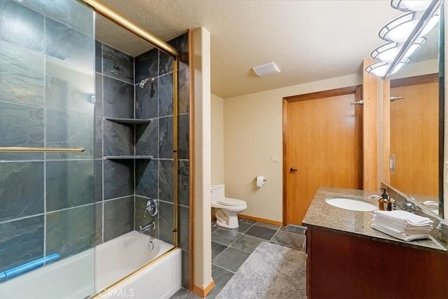 15516 Valley View Dr, Weed, CA 96094 - full bath with combined bath / shower with glass door, toilet, vanity, a textured ceiling, and baseboards