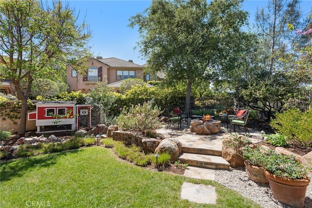 2 Williamsburg Ln, Coto De Caza, CA 92679 - view of yard featuring an outdoor fire pit, a patio area, and fence