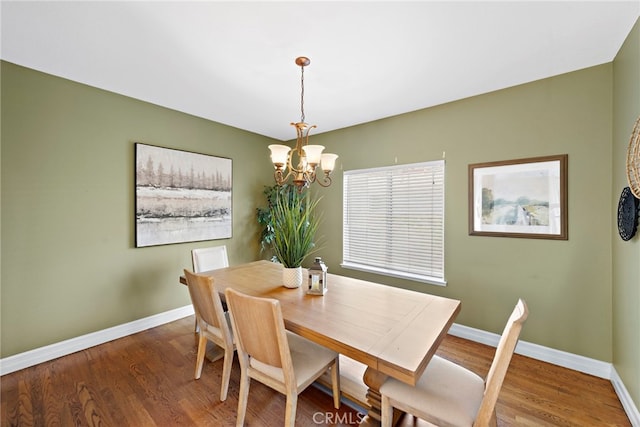 10 Cambridge Ct, Coto De Caza, CA 92679 - dining area with a chandelier, wood finished floors, and baseboards