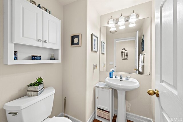 10 Cambridge Ct, Coto De Caza, CA 92679 - bathroom featuring toilet and baseboards