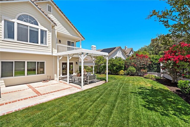 10 Cambridge Ct, Coto De Caza, CA 92679 - view of grassy yard with a balcony, a patio, and an outdoor living space