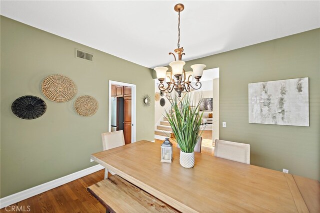 10 Cambridge Ct, Coto De Caza, CA 92679 - dining space with a chandelier, wood finished floors, baseboards, and stairway