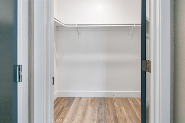 5703 Violet Ct, Atwater, CA 95301 - spacious closet featuring light wood-style flooring