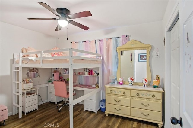 bedroom featuring ceiling fan and dark wood-type flooring