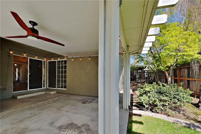 2100 Sherwood Ave Unit A, Modesto, CA 95350 - view of patio / terrace with ceiling fan and fence