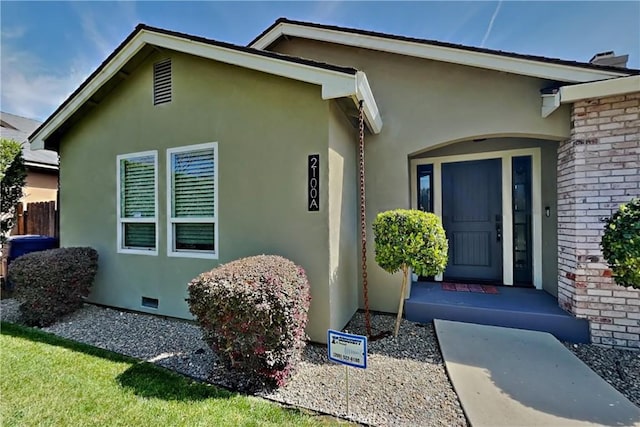2100 Sherwood Ave Unit A, Modesto, CA 95350 - view of exterior entry featuring stucco siding