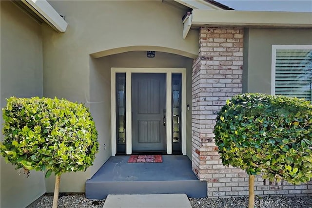 2100 Sherwood Ave Unit A, Modesto, CA 95350 - view of exterior entry with stucco siding and brick siding